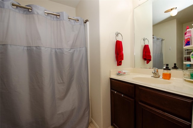 9414 Emerald Green Dr, Rosharon, TX 77583 - full bathroom featuring vanity and a shower with shower curtain