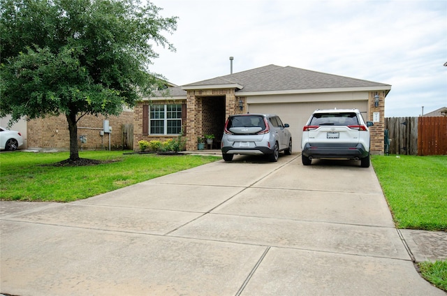 9414 Emerald Green Dr, Rosharon, TX 77583 - single story home featuring brick siding, concrete driveway, and an attached garage