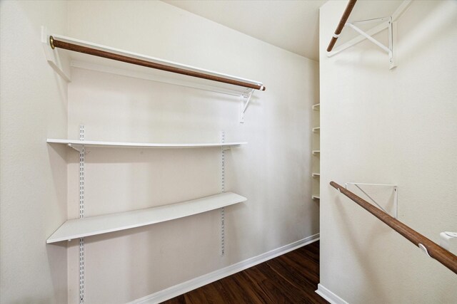 10115 Willow Crossing Dr, Houston, TX 77064 - walk in closet featuring wood finished floors