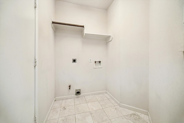 10115 Willow Crossing Dr, Houston, TX 77064 - laundry area featuring electric dryer hookup, hookup for a washing machine, baseboards, hookup for a gas dryer, and light tile patterned floors
