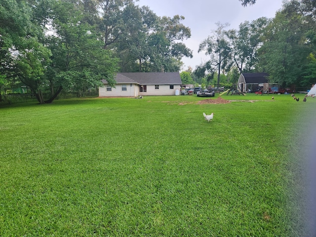27491 Lantern Ln, New Caney, TX 77357 - view of green lawn