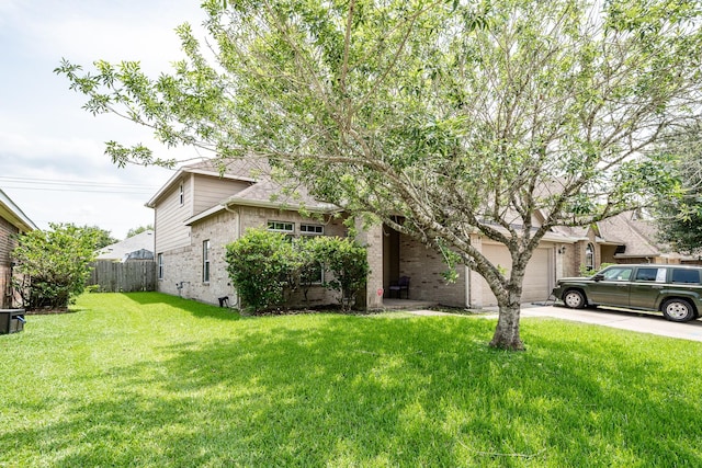 934 Sage St, Baytown, TX 77521 - obstructed view of property with concrete driveway, brick siding, and a garage