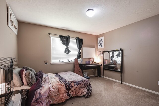 934 Sage St, Baytown, TX 77521 - bedroom featuring carpet flooring and baseboards