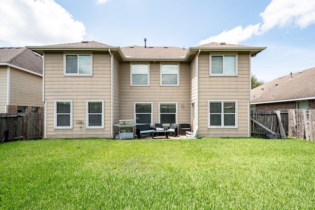934 Sage St, Baytown, TX 77521 - rear view of house with an outdoor hangout area and a patio