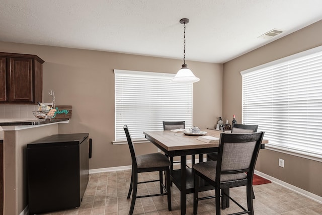 934 Sage St, Baytown, TX 77521 - dining space with baseboards