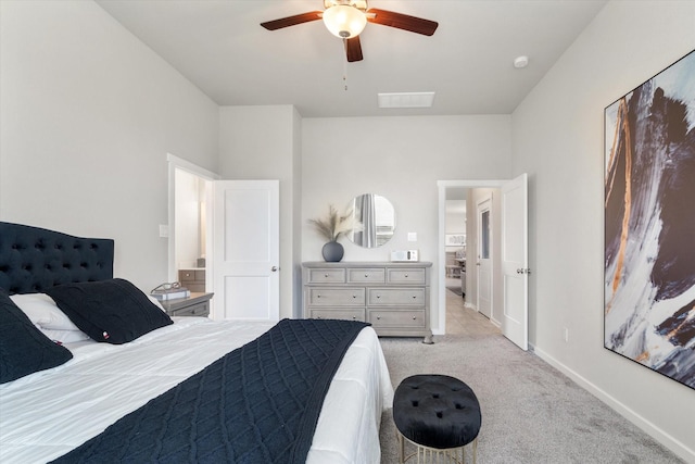 6903 Aspen Peak Dr, Baytown, TX 77521 - bedroom with light carpet, baseboards, and ceiling fan