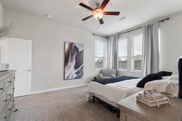 6903 Aspen Peak Dr, Baytown, TX 77521 - bedroom featuring carpet floors, baseboards, and ceiling fan