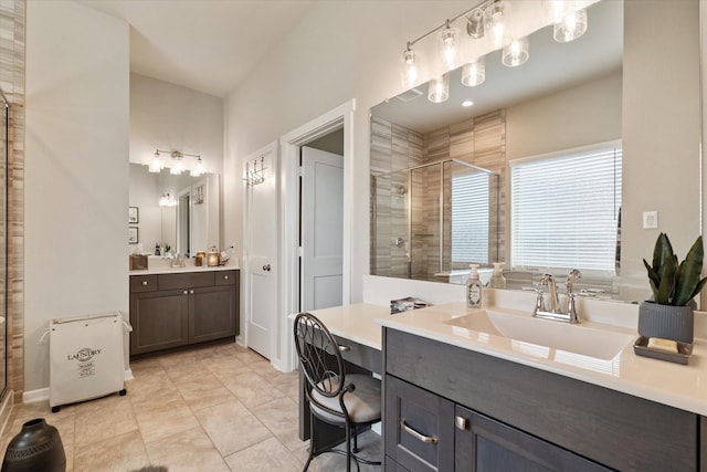 6903 Aspen Peak Dr, Baytown, TX 77521 - bathroom featuring a shower stall and two vanities