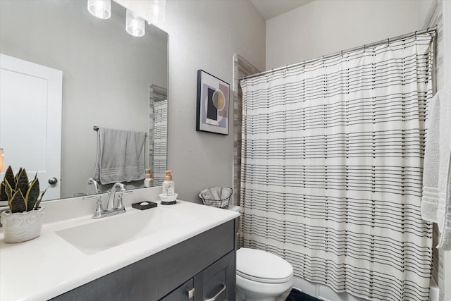 6903 Aspen Peak Dr, Baytown, TX 77521 - bathroom featuring vanity, toilet, and shower / bathtub combination with curtain