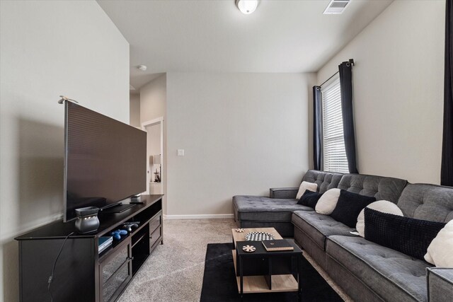 6903 Aspen Peak Dr, Baytown, TX 77521 - carpeted living room featuring baseboards
