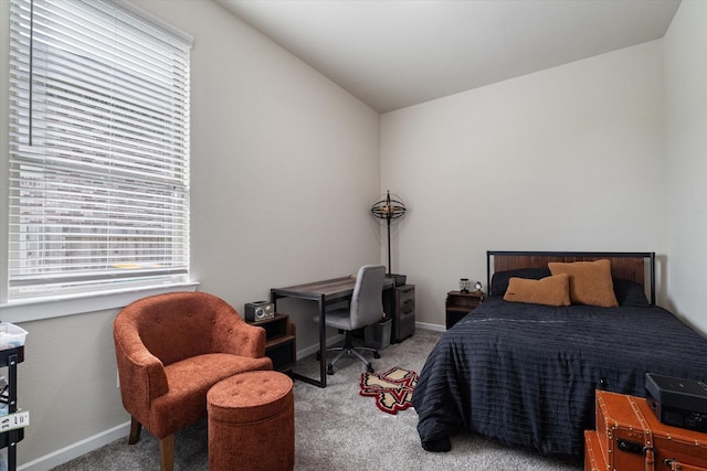 6903 Aspen Peak Dr, Baytown, TX 77521 - carpeted bedroom featuring vaulted ceiling and baseboards