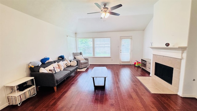 25023 Ivy Trace Ln, Katy, TX 77494 - living area with wood-type flooring, ceiling fan, a fireplace, and baseboards