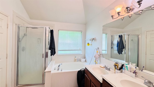 25023 Ivy Trace Ln, Katy, TX 77494 - bathroom featuring vaulted ceiling, vanity, healthy amount of natural light, a shower stall, and a garden tub