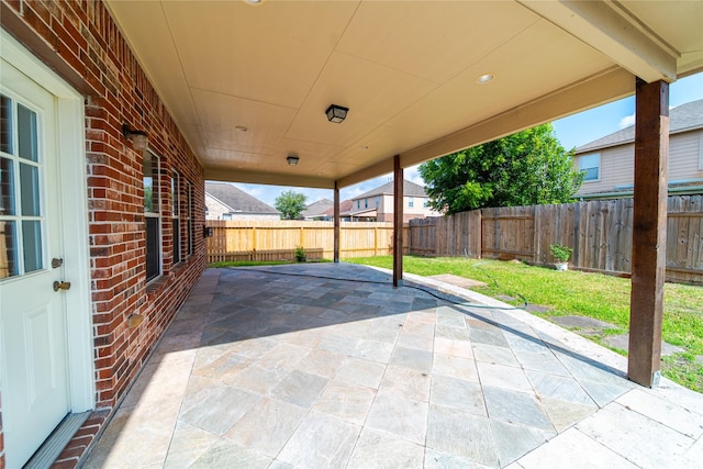 19422 Harvest Stream Way, Houston, TX 77084 - view of patio / terrace featuring a carport