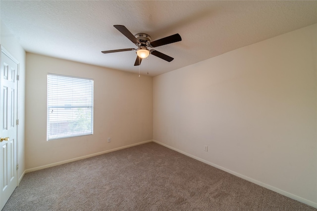 19422 Harvest Stream Way, Houston, TX 77084 - spare room featuring carpet, a ceiling fan, and baseboards