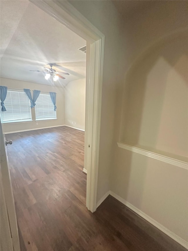 8239 Polaris Point Ln, Cypress, TX 77433 - hall with dark wood-style flooring, baseboards, and lofted ceiling