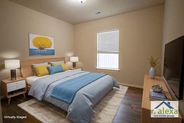 8239 Polaris Point Ln, Cypress, TX 77433 - bedroom featuring wood finished floors and baseboards