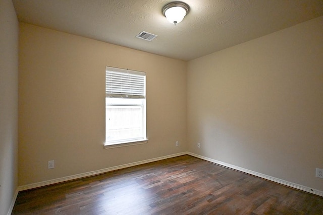 8239 Polaris Point Ln, Cypress, TX 77433 - empty room with dark wood-type flooring