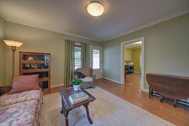1026 Atchison St, Sealy, TX 77474 - living room featuring wood finished floors and crown molding