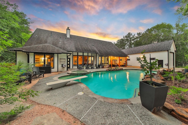 11698 Creek View Ln, Conroe, TX 77385 - view of swimming pool with a patio and a pool with connected hot tub