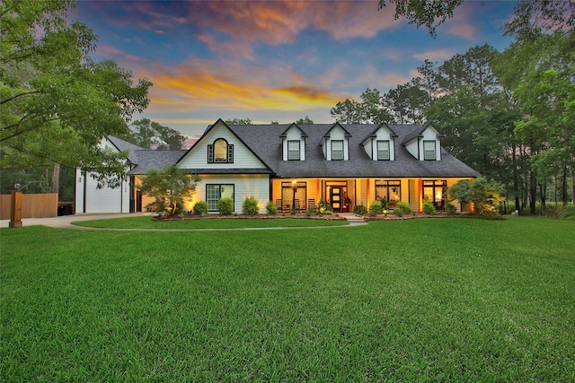 11698 Creek View Ln, Conroe, TX 77385 - cape cod house featuring a porch, a garage, concrete driveway, and a shingled roof