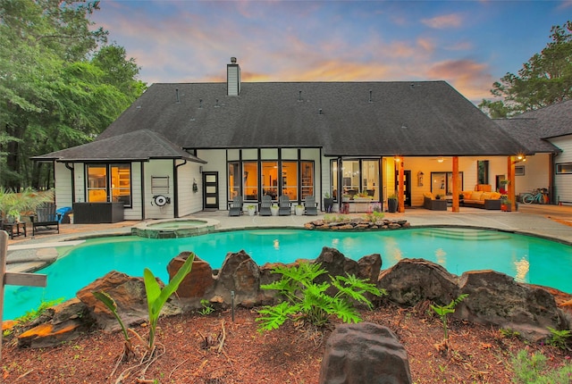 11698 Creek View Ln, Conroe, TX 77385 - view of swimming pool with an outdoor hangout area, a patio, and a pool with connected hot tub