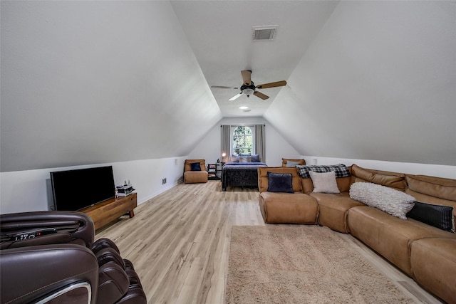 11698 Creek View Ln, Conroe, TX 77385 - living room featuring wood finished floors, vaulted ceiling, and ceiling fan