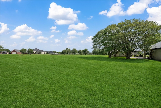 9035 N Point Dr, Beach City, TX 77523 - view of green lawn