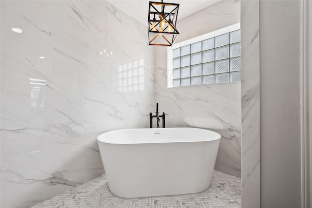 9035 N Point Dr, Beach City, TX 77523 - full bath featuring a freestanding bath and tile walls