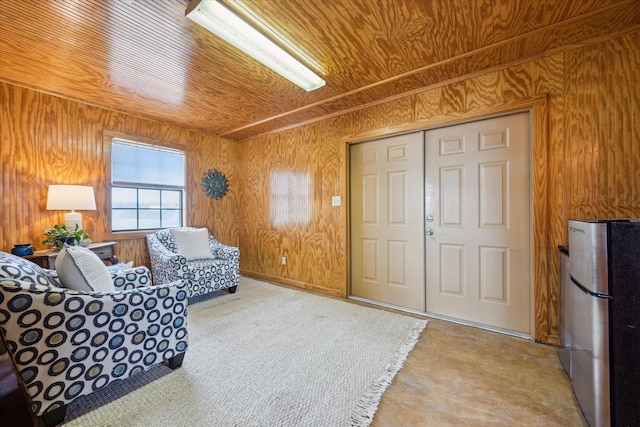 115 N River Place Rd, Rio Frio, TX 78879 - living area featuring wood walls and wood ceiling