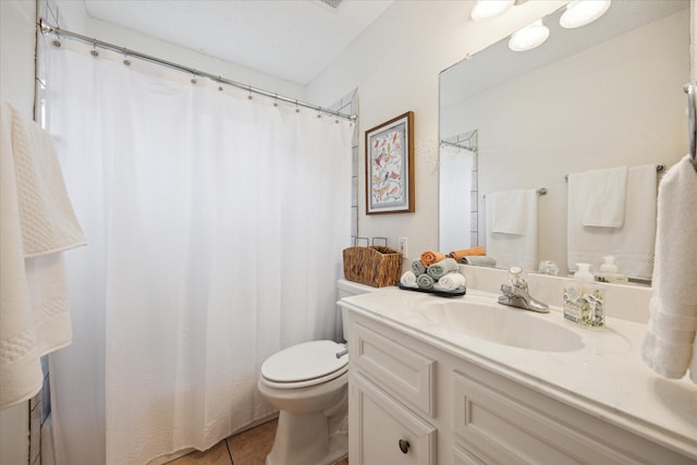 115 N River Place Rd, Rio Frio, TX 78879 - full bathroom with toilet, vanity, tile patterned flooring, and curtained shower