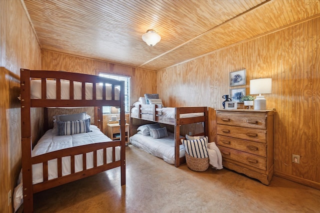 115 N River Place Rd, Rio Frio, TX 78879 - bedroom featuring wood ceiling and wood walls