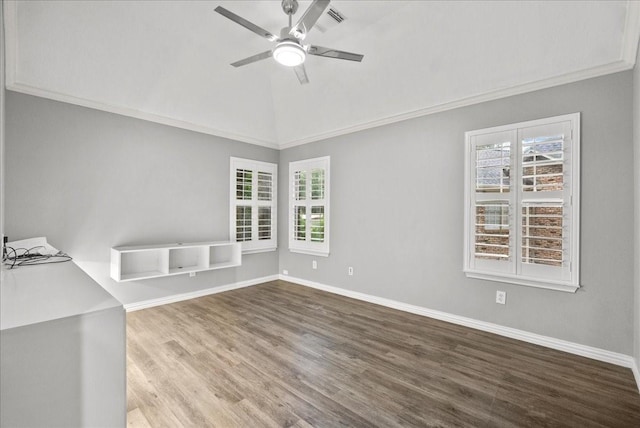 16610 Avenfield Rd, Tomball, TX 77377 - empty room featuring a ceiling fan, plenty of natural light, wood finished floors, and vaulted ceiling