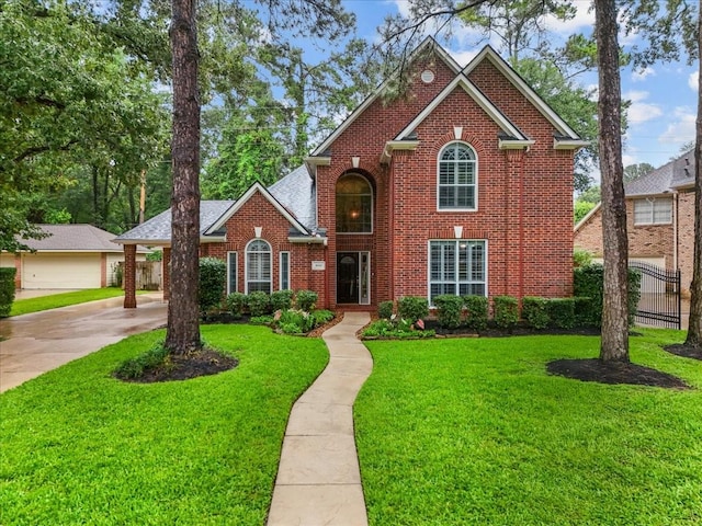 16610 Avenfield Rd, Tomball, TX 77377 - traditional-style home with brick siding