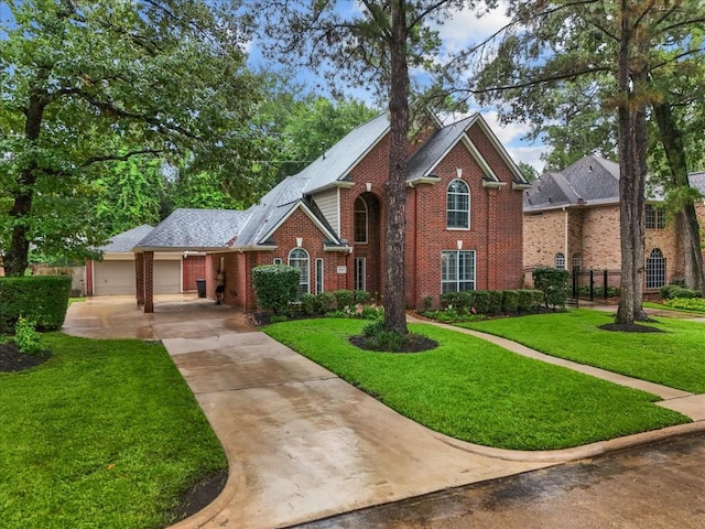 16610 Avenfield Rd, Tomball, TX 77377 - view of front of house featuring concrete driveway, brick siding, and a garage