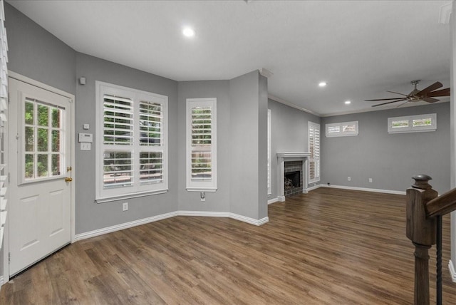 16610 Avenfield Rd, Tomball, TX 77377 - unfurnished living room with a ceiling fan, wood finished floors, recessed lighting, and a fireplace