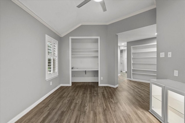 16610 Avenfield Rd, Tomball, TX 77377 - spare room featuring built in features, crown molding, wood finished floors, a ceiling fan, and lofted ceiling