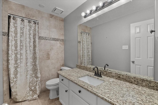 16610 Avenfield Rd, Tomball, TX 77377 - full bath with vanity, tile patterned flooring, a shower with curtain, and a textured ceiling