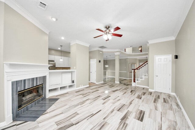 12819 Kingsbridge Ln, Houston, TX 77077 - unfurnished living room featuring a ceiling fan, recessed lighting, ornamental molding, baseboards, and a fireplace with flush hearth