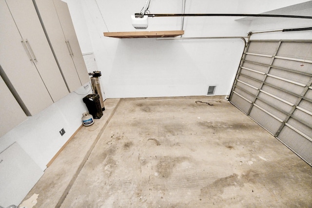 12819 Kingsbridge Ln, Houston, TX 77077 - garage featuring a garage door opener