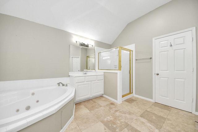 12819 Kingsbridge Ln, Houston, TX 77077 - full bathroom with a shower stall, a whirlpool tub, vanity, and lofted ceiling