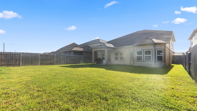 10710 Cliffs View Dr, Rosharon, TX 77583 - back of house featuring roof with shingles