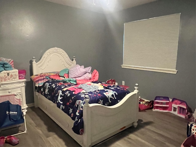 16219 Purpleridge Ct, Houston, TX 77053 - bedroom with wood finished floors