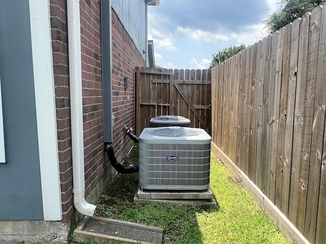 16219 Purpleridge Ct, Houston, TX 77053 - exterior view of brick siding and cooling unit