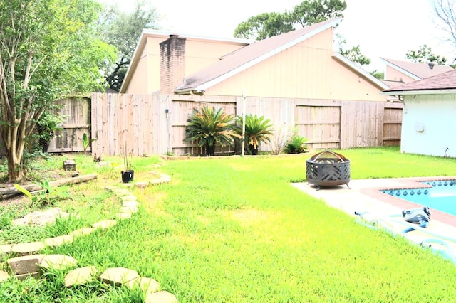 839 Hidden Canyon Rd, Katy, TX 77450 - view of yard with a fire pit
