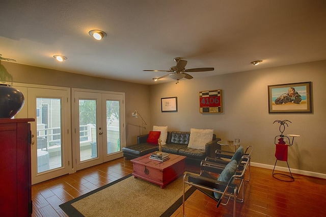 907 Davis Rd, League City, TX 77573 - living area with wood finished floors, ceiling fan, baseboards, and french doors