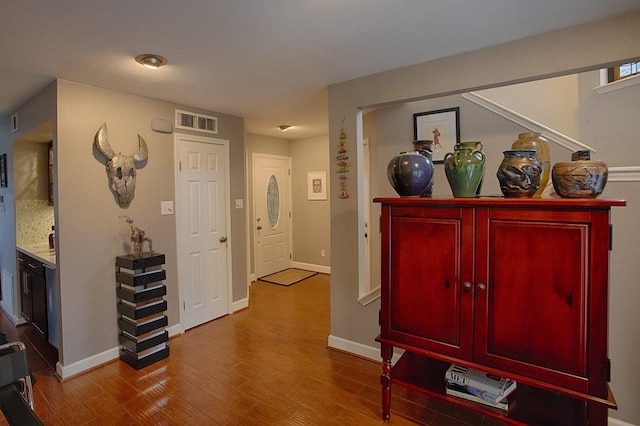907 Davis Rd, League City, TX 77573 - hallway featuring wood finished floors and baseboards