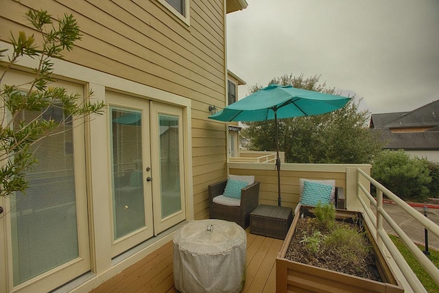 907 Davis Rd, League City, TX 77573 - wooden terrace with french doors
