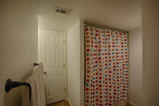907 Davis Rd, League City, TX 77573 - bathroom with a shower with shower curtain