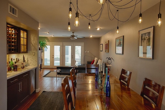 907 Davis Rd, League City, TX 77573 - dining room with dark wood-style flooring and ceiling fan